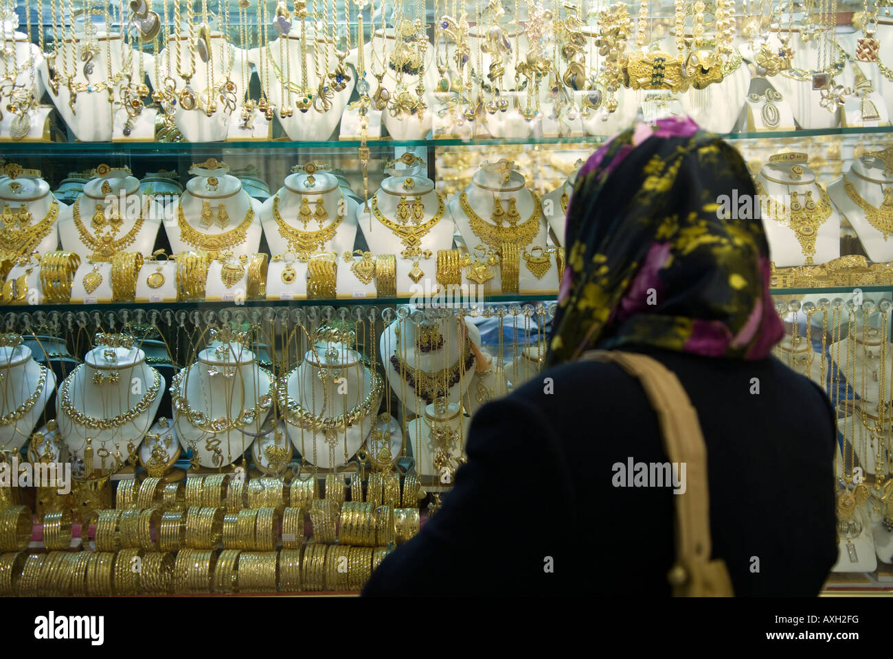 Libyan woman browsing jewellery shop in the souq Medina Tripoli Libya