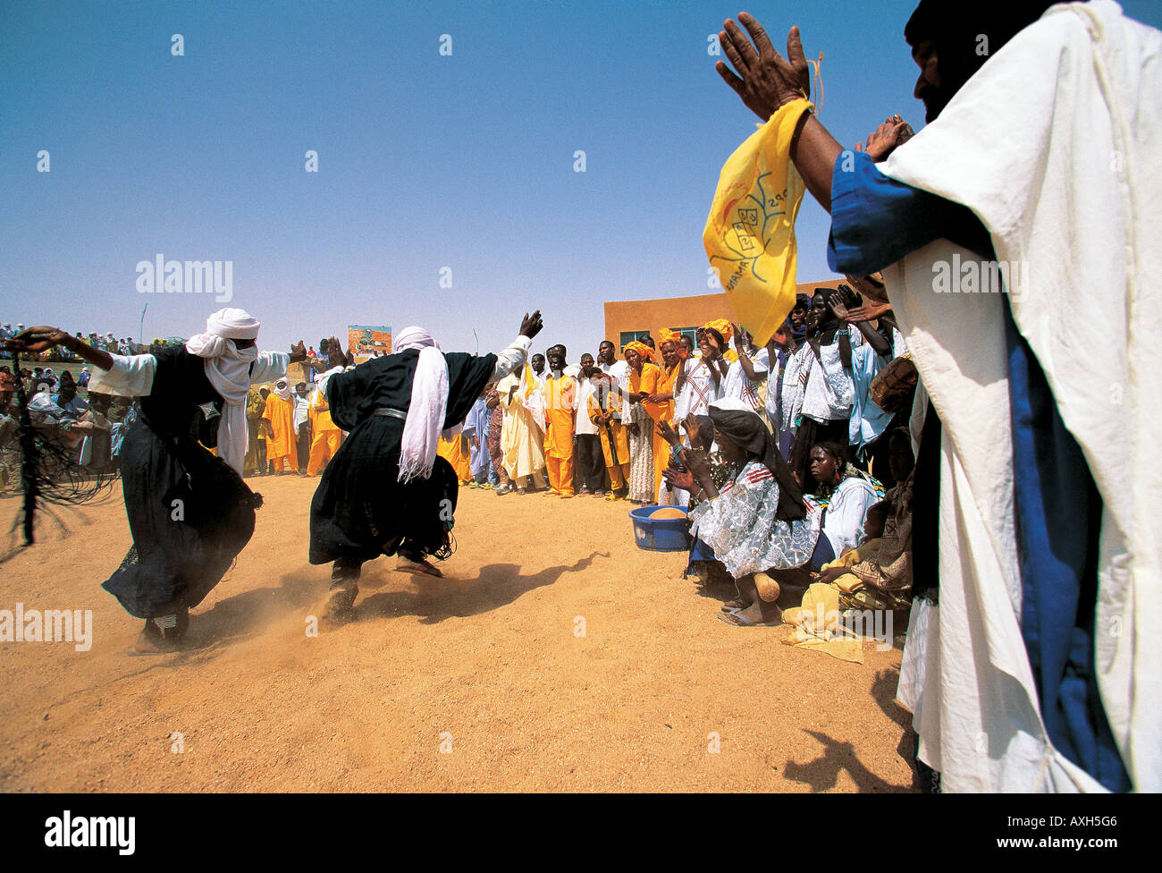 Tuaregs dancing in political party meeting, Agadez Niger. Stock Photo