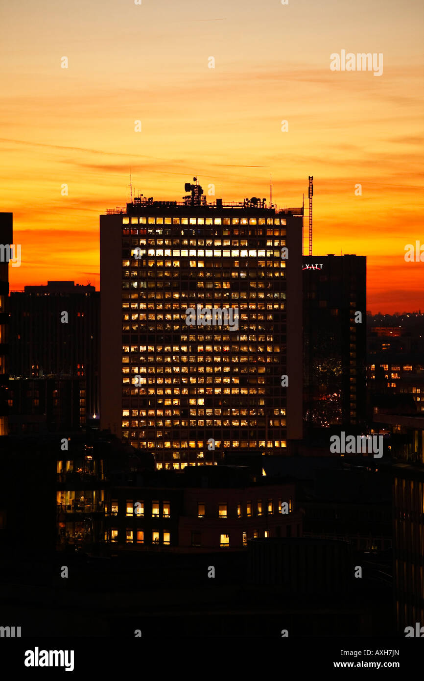 Alpha Tower in Birmingham City Centre at sunset Hyatt hotel can also be seen Stock Photo