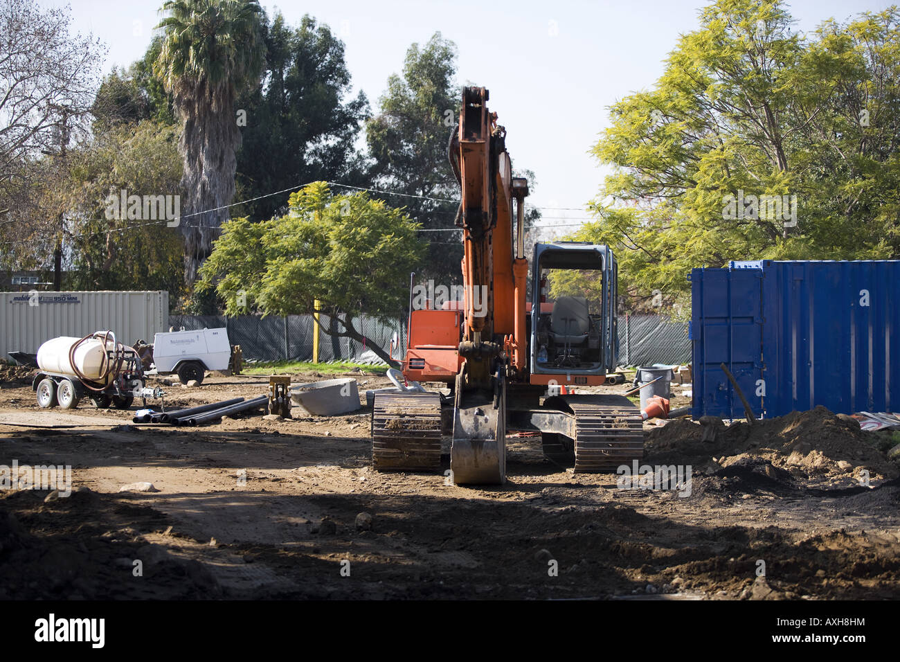 Excavator at construction site Stock Photo - Alamy