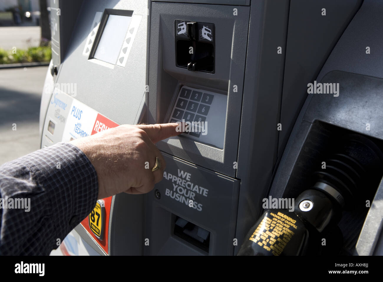 Man paying for gas Stock Photo Alamy