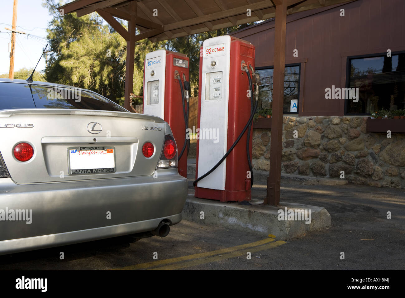 Lexus IS300 at gas pump Stock Photo Alamy