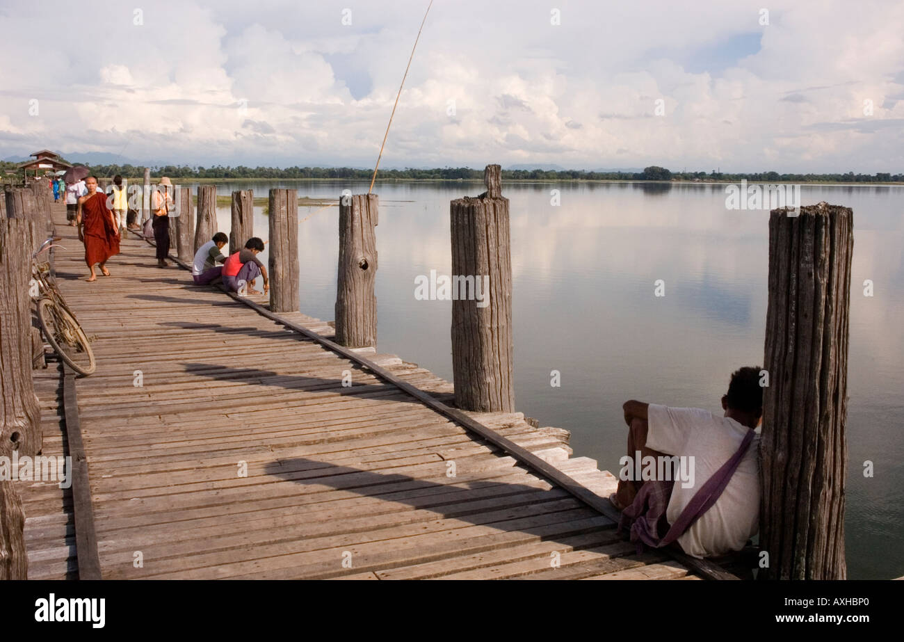 Stock photograph of the U Bein old teak bridge across Taungthaman Lake ...