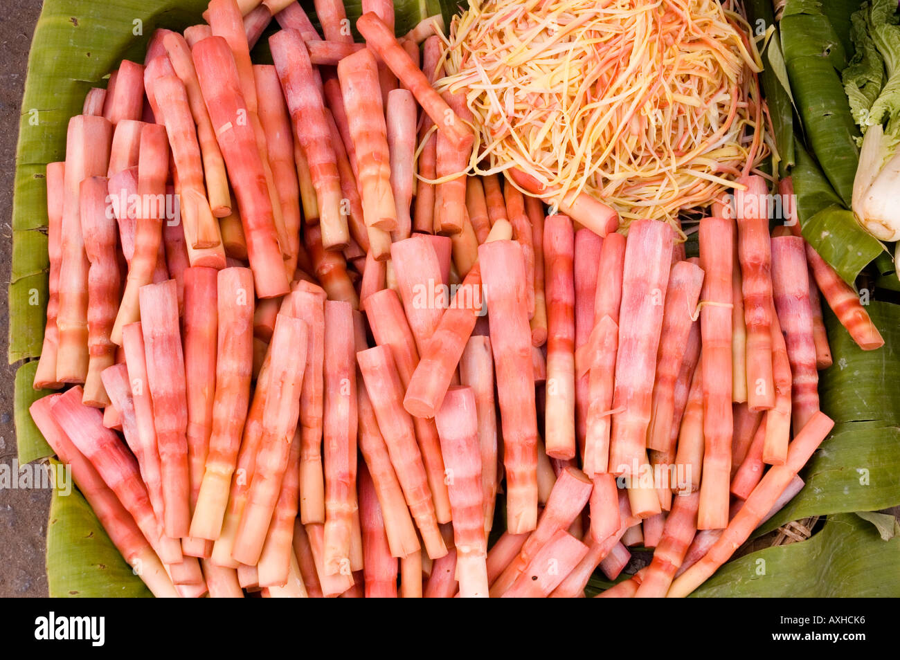 Stock photograph of cooked bamboo shoots for sale at Mandalay market in Myanmar 2006 Stock Photo