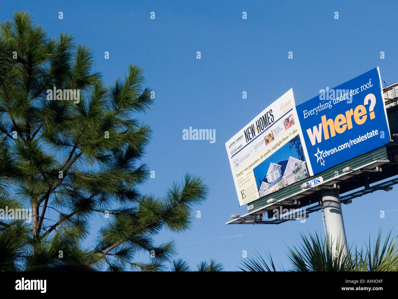 Billboard advertising boards against blue sky in Houston Texas TX USA