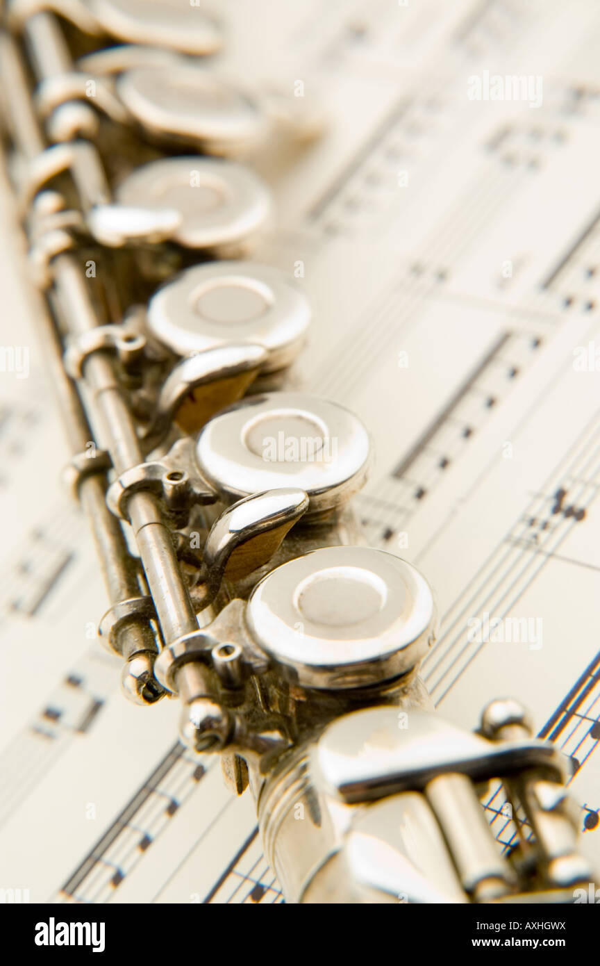 Detail of flute on top of sheet music Stock Photo - Alamy