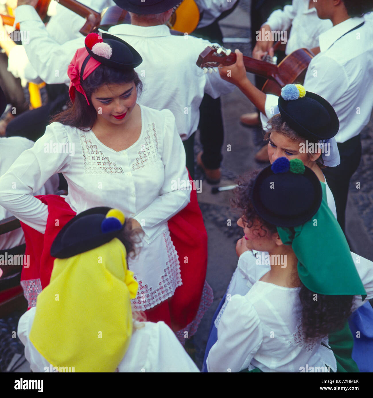 Group of four young girls in traditional costume at Canary Village Las Palmas Gran Canaria Island The Canary Islands Stock Photo