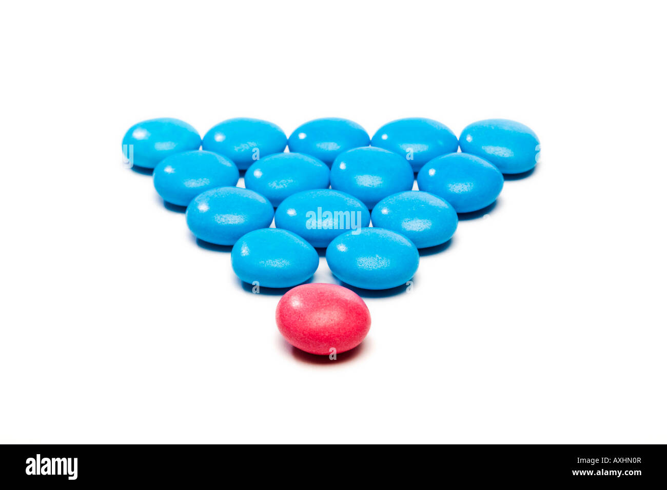 Coloured candy used to show the concept of leadership or gender Stock Photo