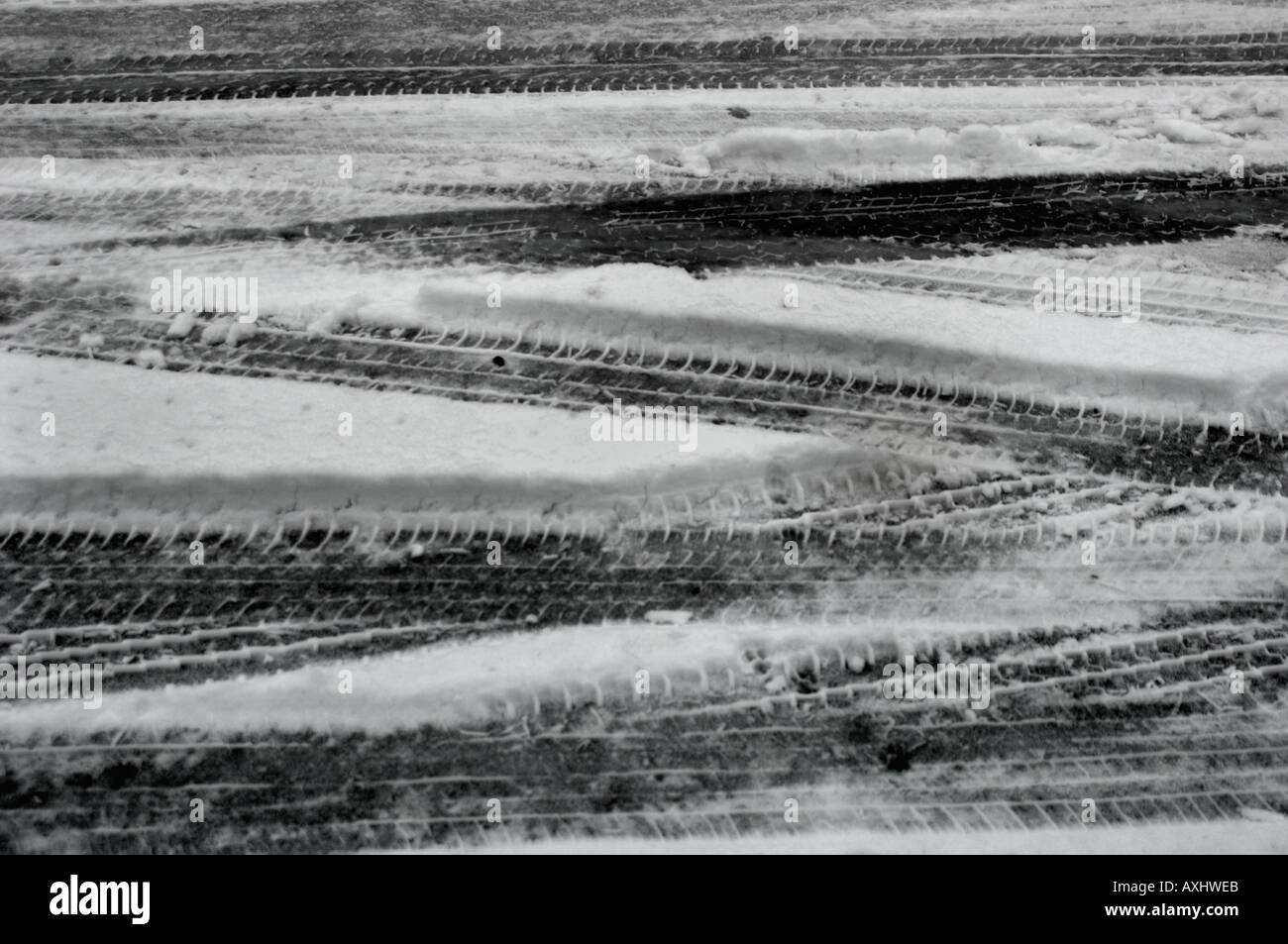 Tyre tracks In The Snow Stock Photo - Alamy