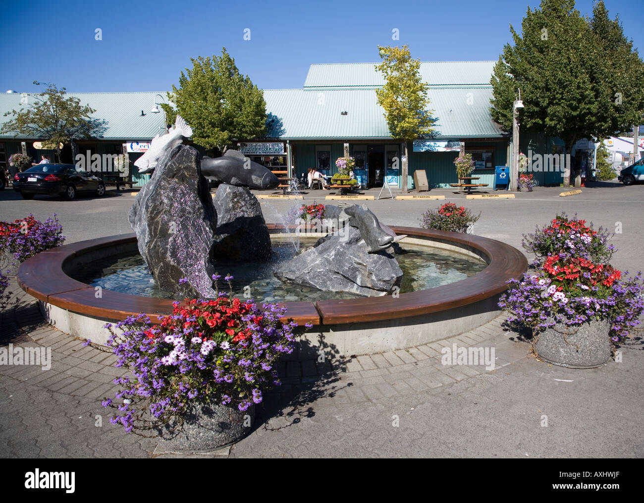 Water feature and fountain in town square with shops Port Alberni Vancouver island Canada Stock Photo