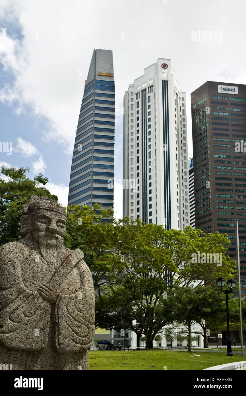 Chinese sculpture looks on at Maybank, Bank of China and Capitalland Stock Photo