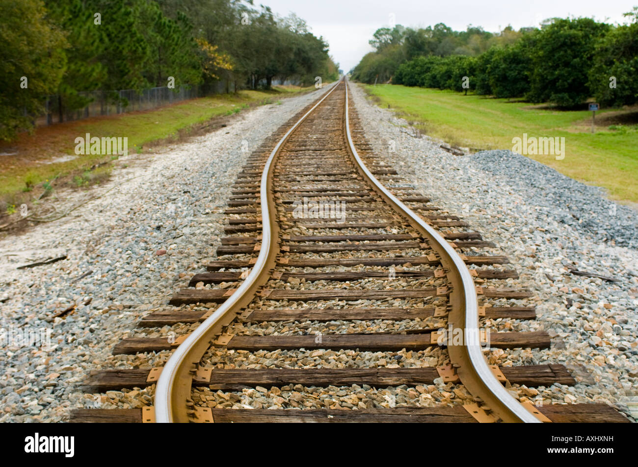 crooked railroad tracks digitally altered Stock Photo Alamy