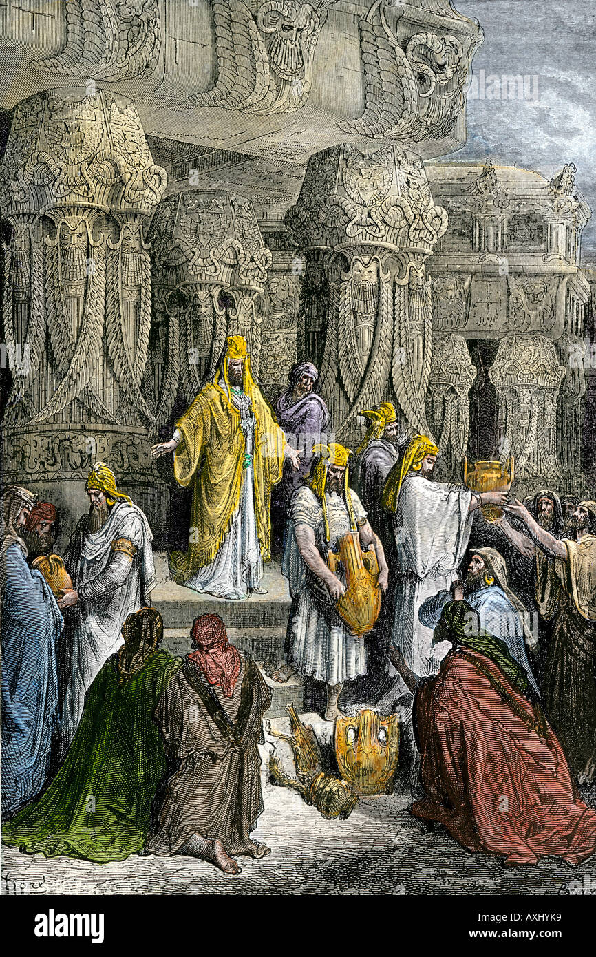 King Cyrus II of Persia restoring the sacred vessels and releasing the captive Jewish people. Hand-colored woodcut of a Gustave Dore illustration Stock Photo