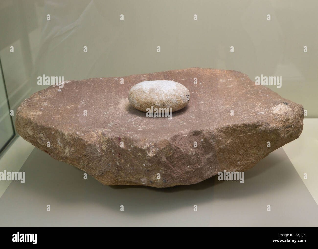 Benalmadena Pueblo Malaga Province Costa del Sol Spain Museum Grinding stone from Neolithic age Circa fifth millenium BC Stock Photo