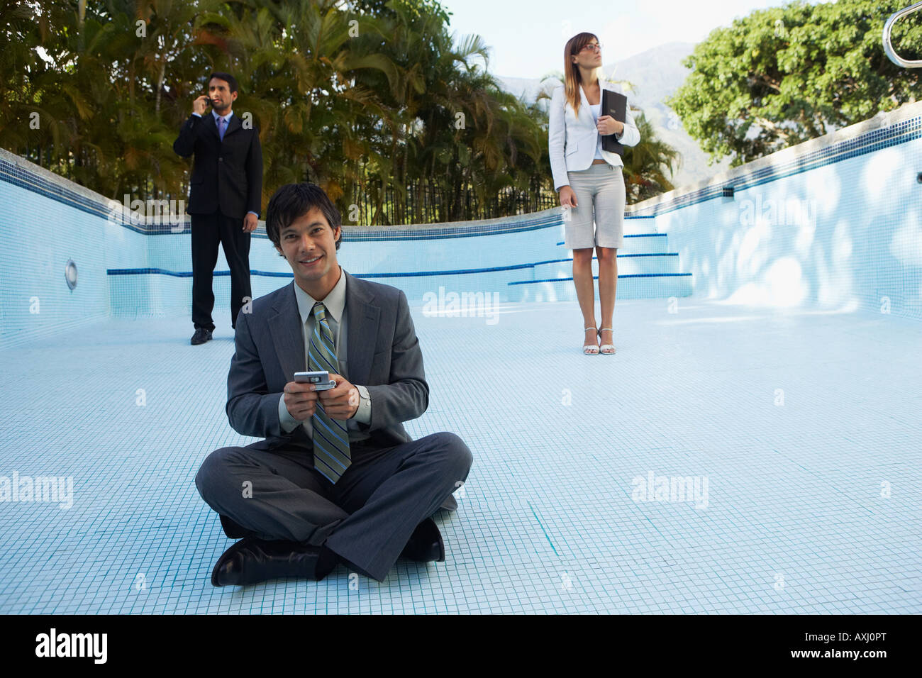 Summer business dreams. Millennial business man in suit floating with  cocktail and laptop in swimming pool. Summer vacation. Funny crazy  businessman Stock Photo - Alamy