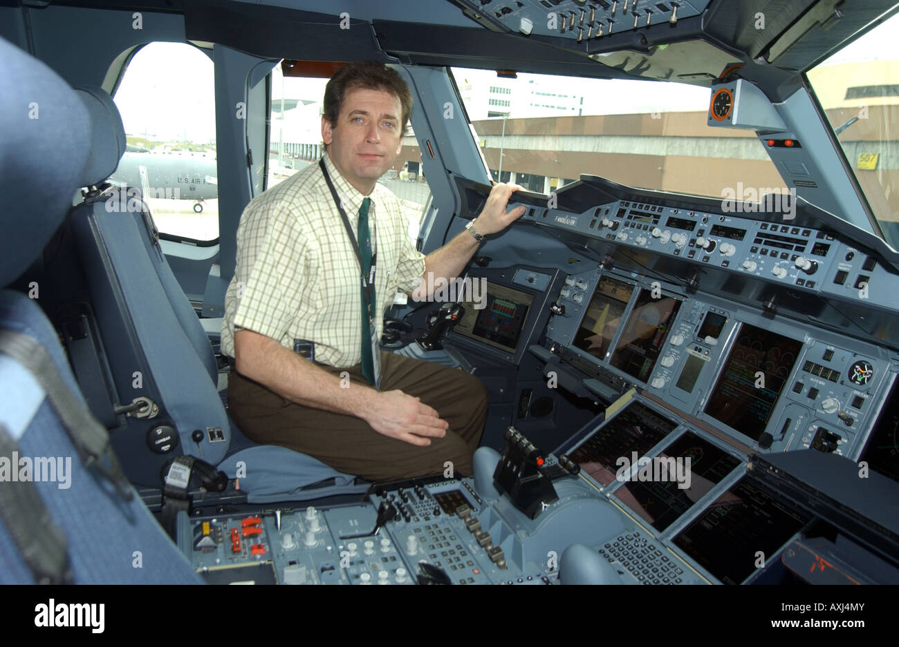 Airbus A380-800 test pilot Pascal Verneau in the cockpit at the Singapore Air Show. Stock Photo