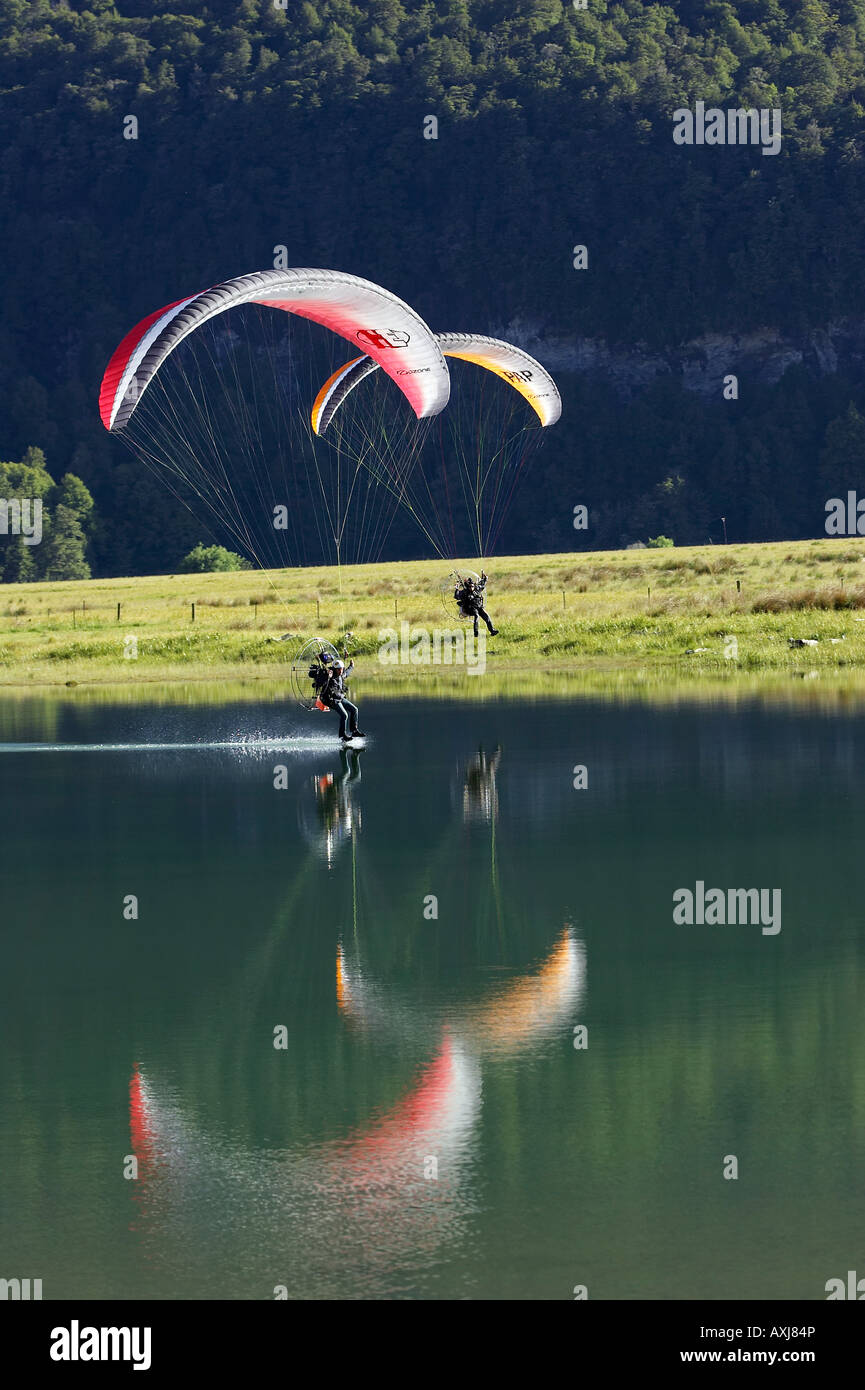 Paramotor skimming water Diamond Lake Paradise near Glenorchy