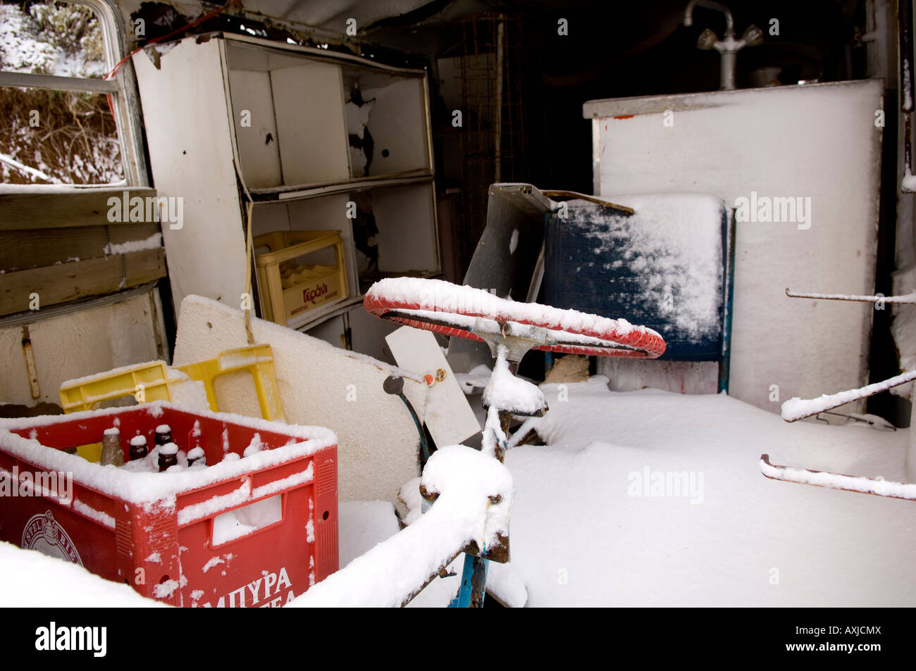 Interior of abandoned, snow covered van Stock Photo Alamy