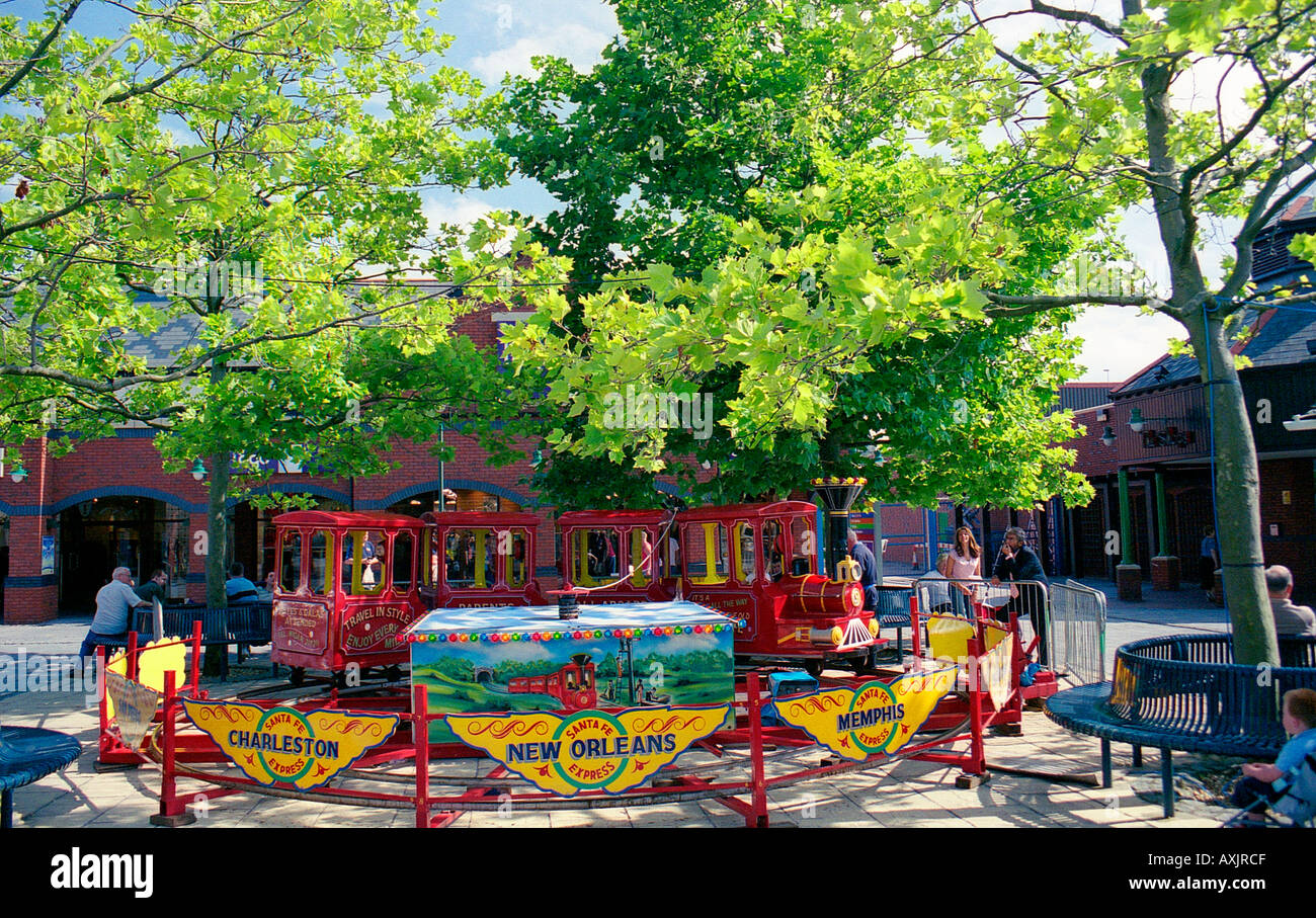 Childrens’ Fairground Ride, Cheshire Oaks Designer Outlet Centre, Ellesmere Port, Merseyside, England Stock Photo