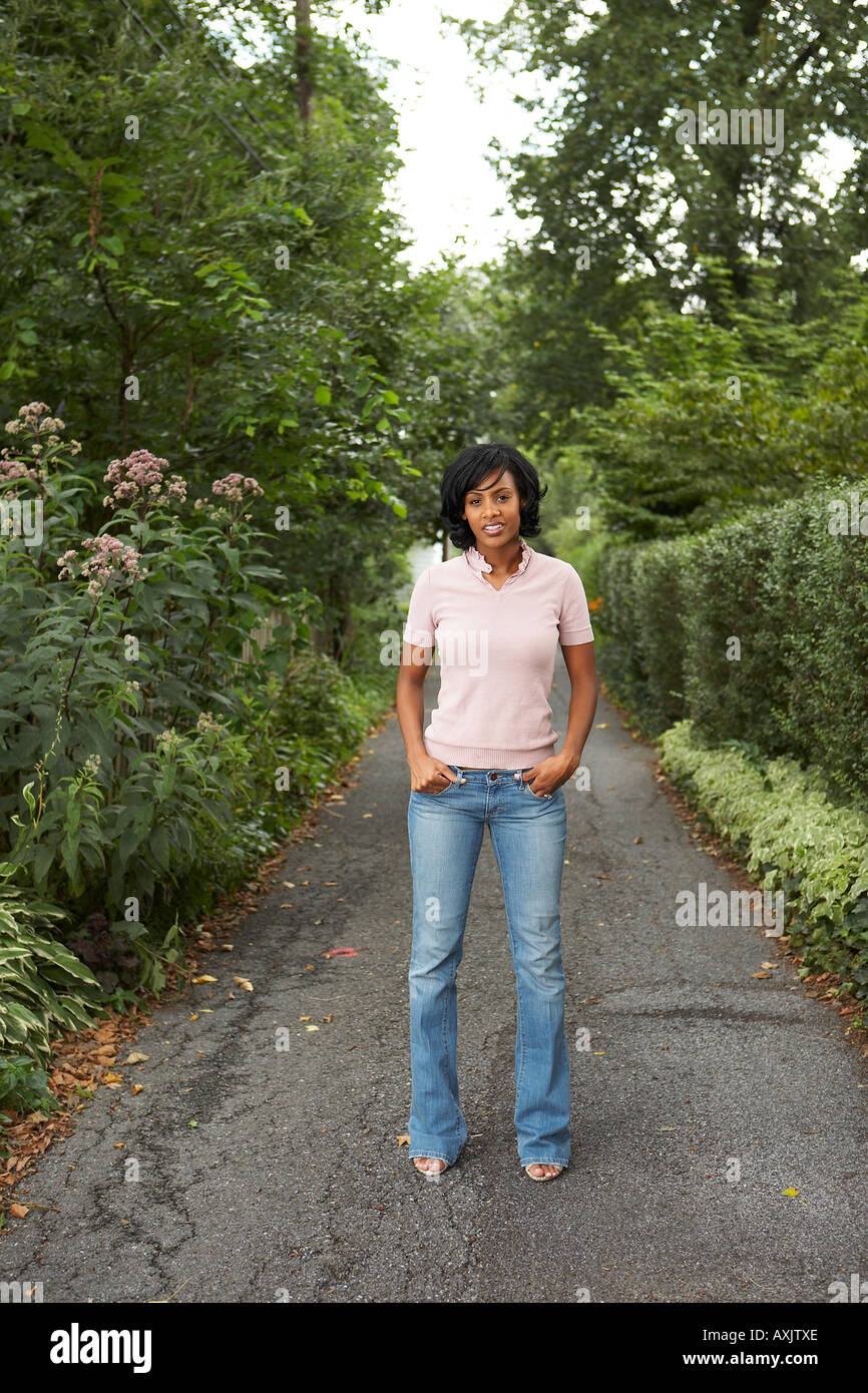 Woman in pink top wearing hi-res stock photography and images - Alamy