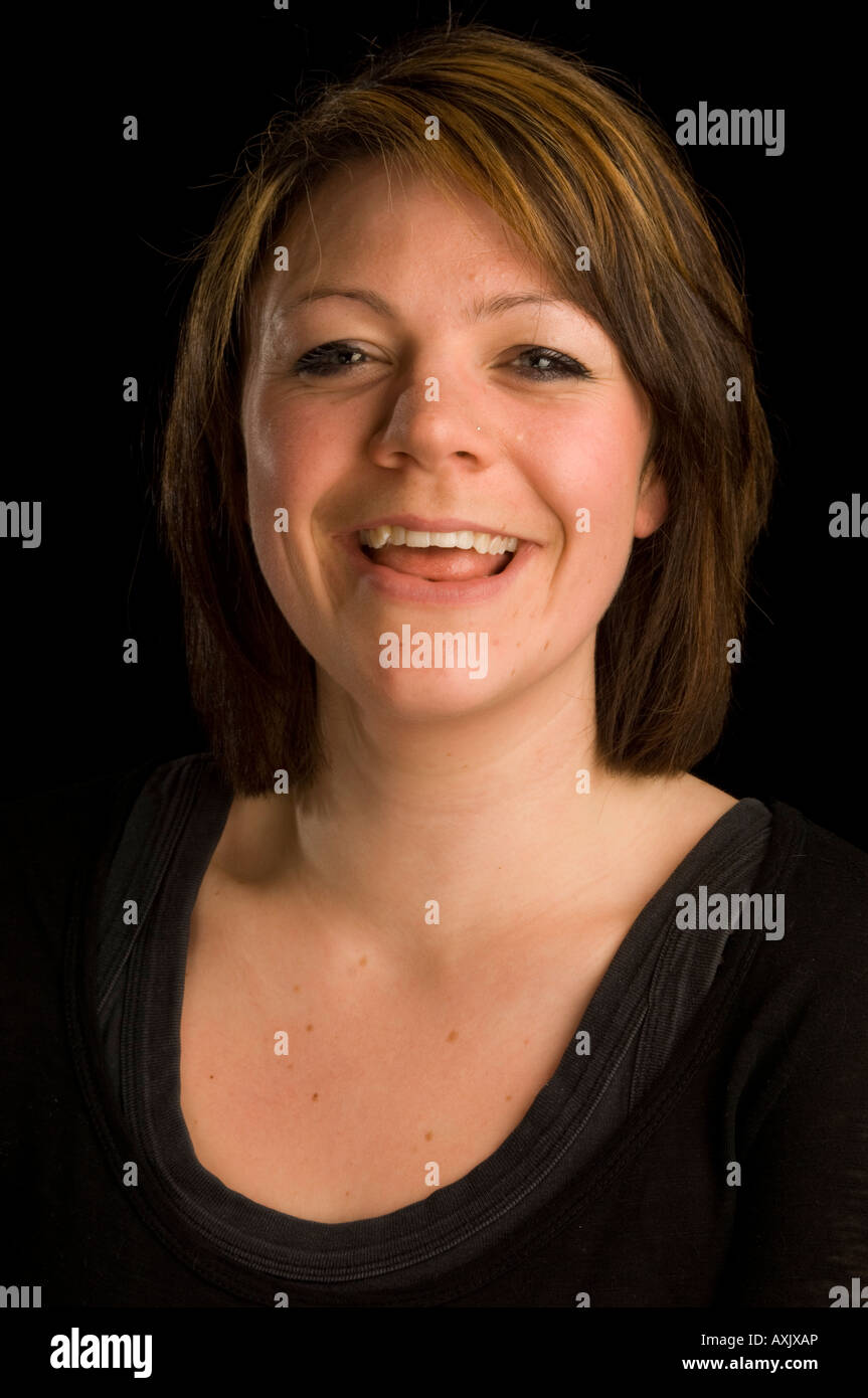 head and shoulders studio portrait of Laughing young adult caucasian ...