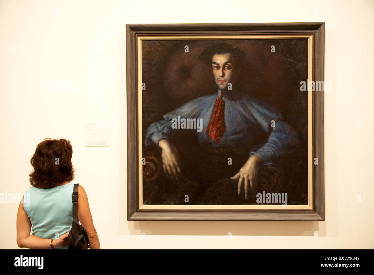 Woman looking at The Cypriot oil painting portrait by William Dobell in