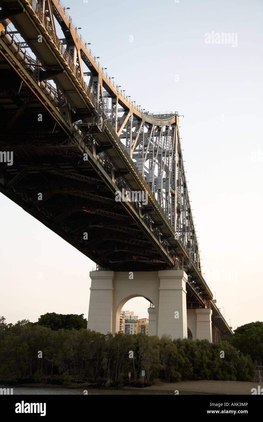 Story Bridge steel truss from below in evening summer sunlight with river Brisbane Queensland QLD Australia Stock Photo