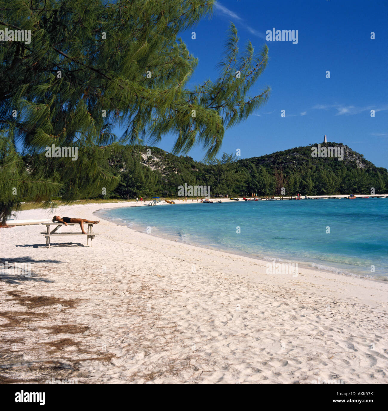 Clear transparent water lapping at edge of a beautiful idyllic curved