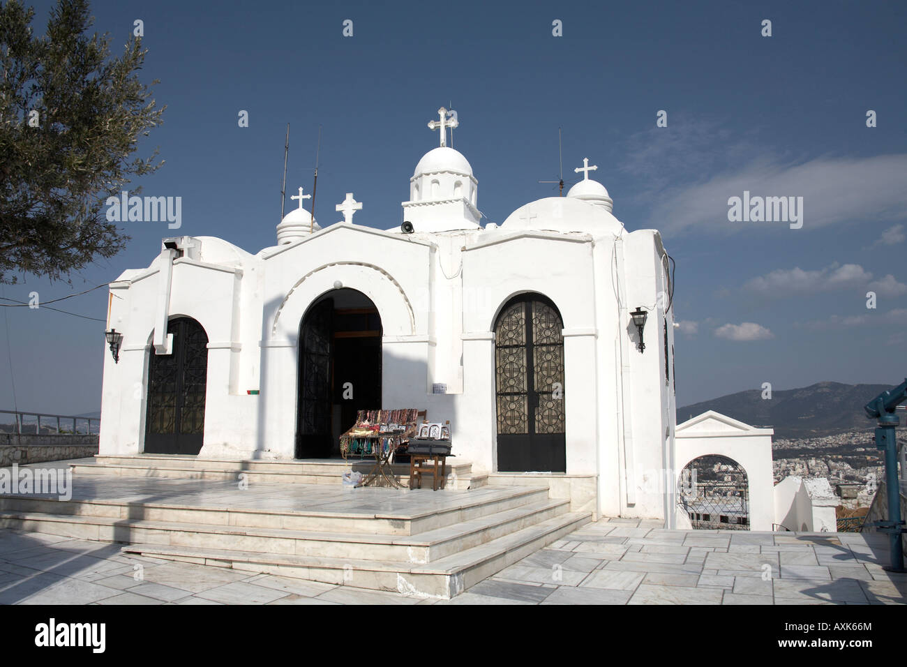 Agios Georgios church against blue sky on Likavitos or Lycabbetus hill in Athens or Athini Greece Stock Photo