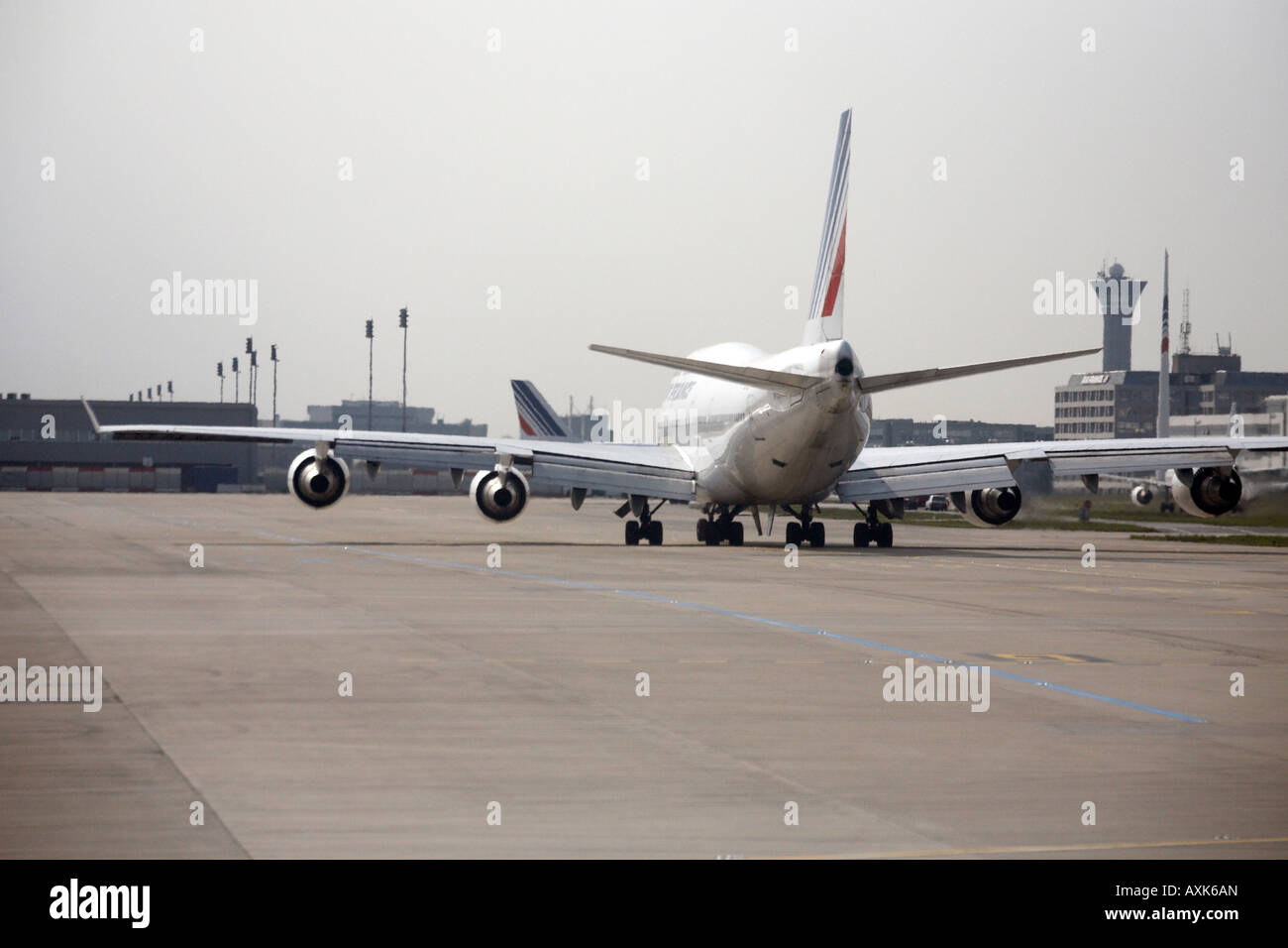 Air France Boeing 747 Jumbo Jet taxiing on taxiway at Charles De Gaulle International Airport Paris France Stock Photo