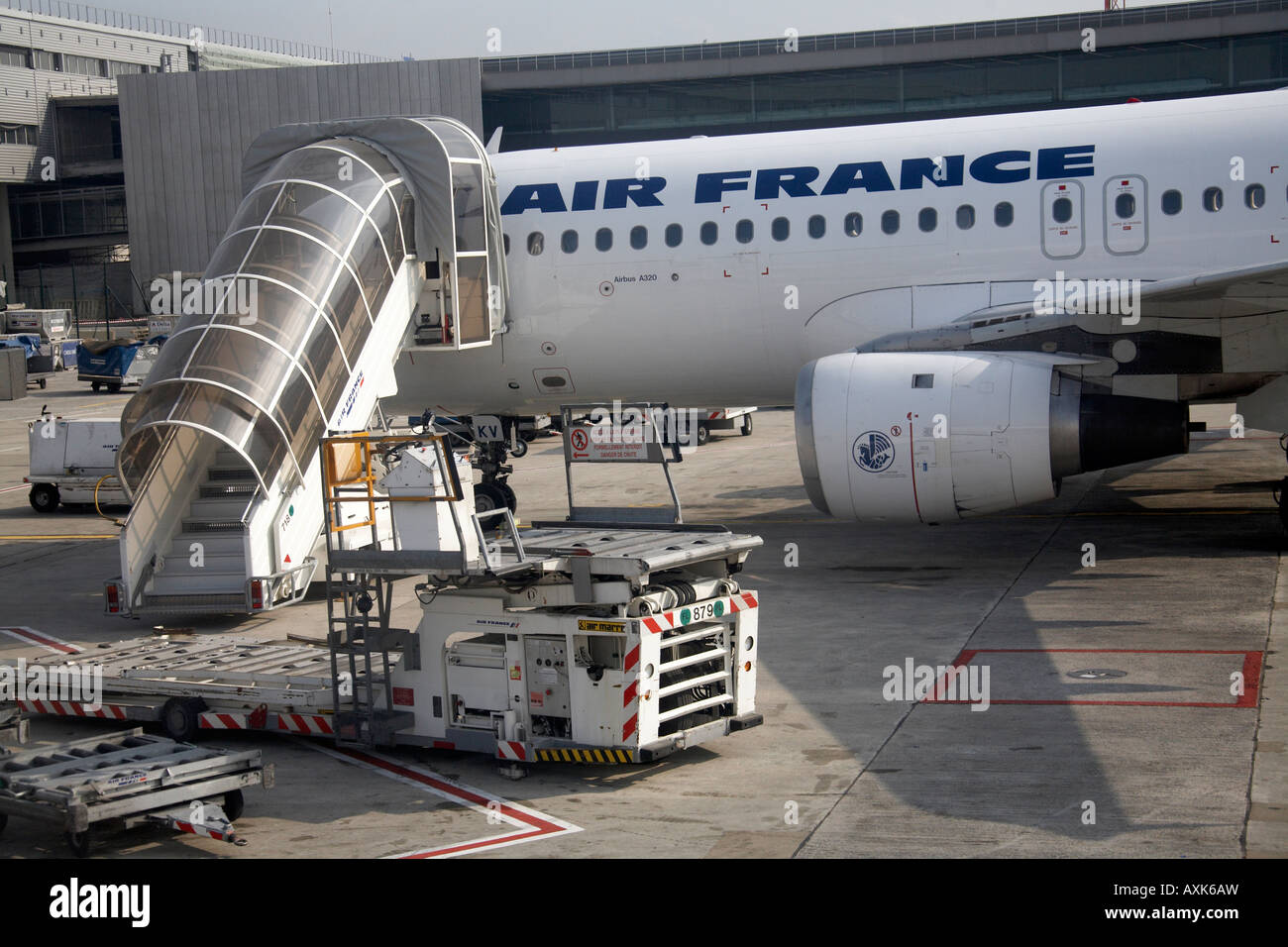 Air France Airbus A320 aircraft with ground servicing at Charles De Gaulle International Airport Paris France Stock Photo