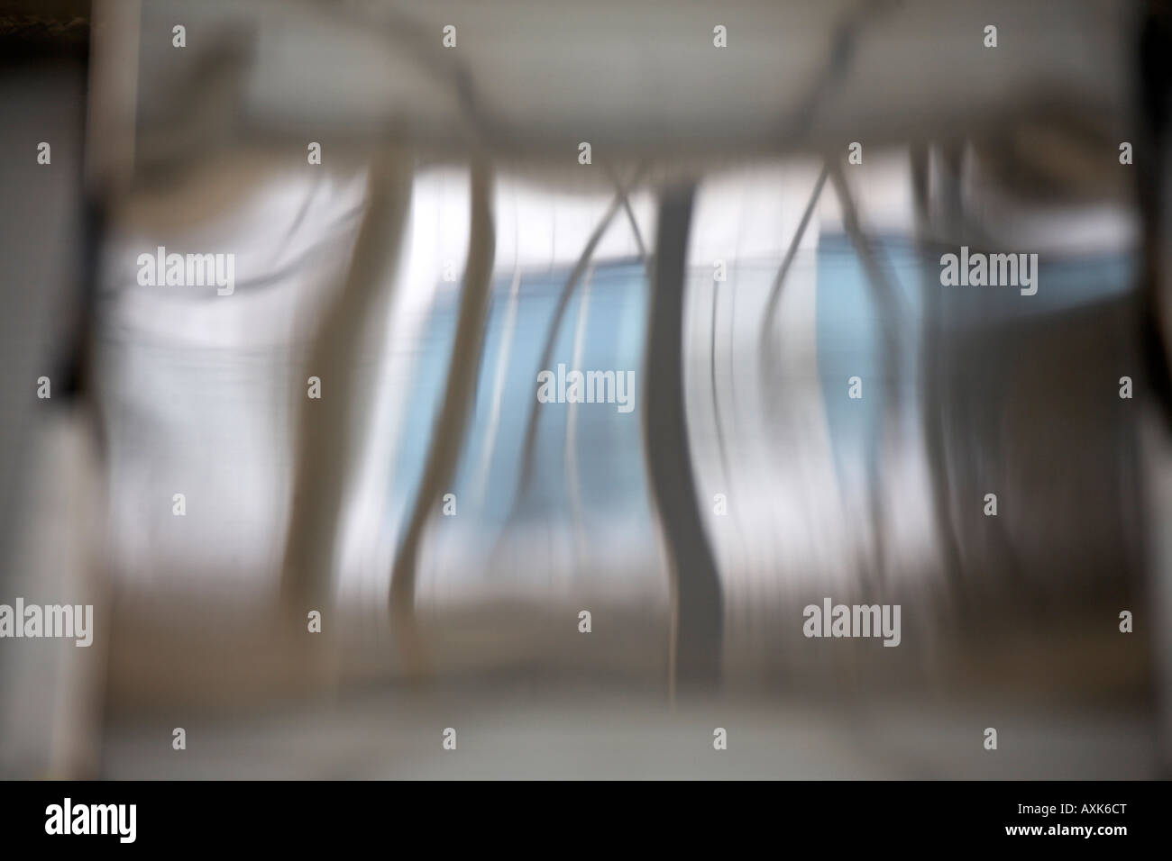 Abstract image of stainless steel seat reflections in TGV railway station at Charles De Gaulle International Airport or Aeroport Stock Photo