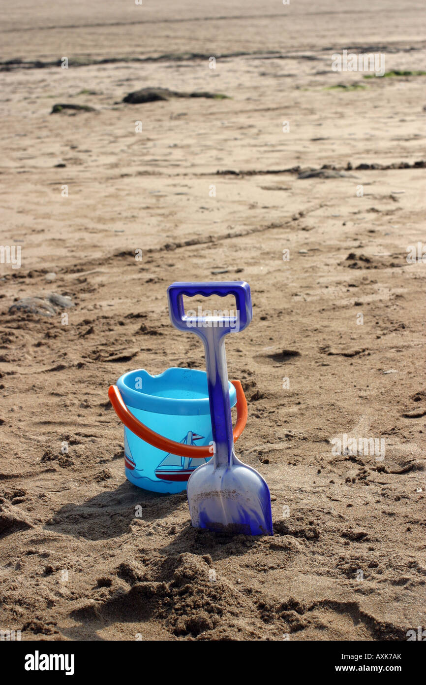 Bucket and Spade on Beach Stock Photo Alamy