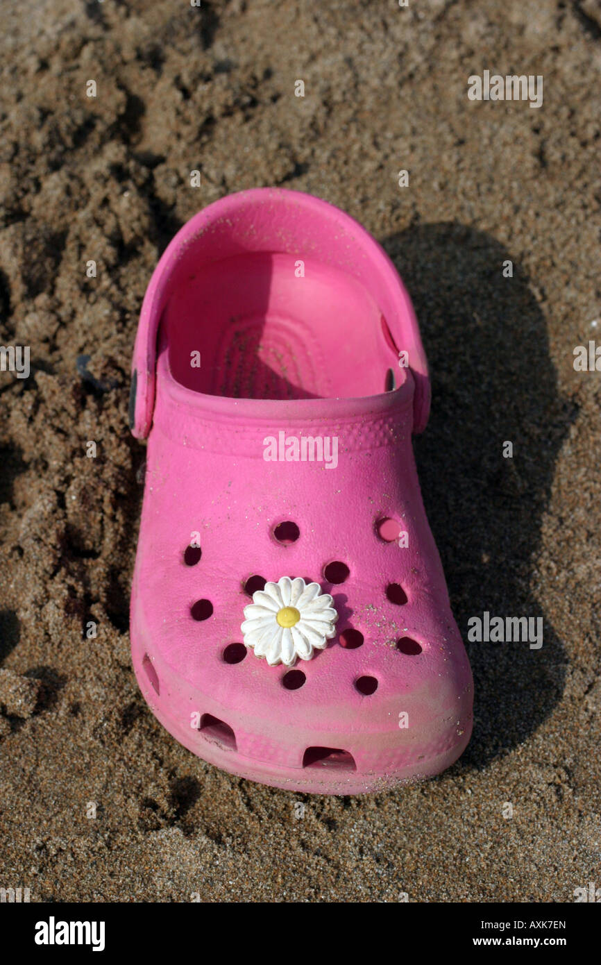 Girl's pink croc Stock Photo - Alamy