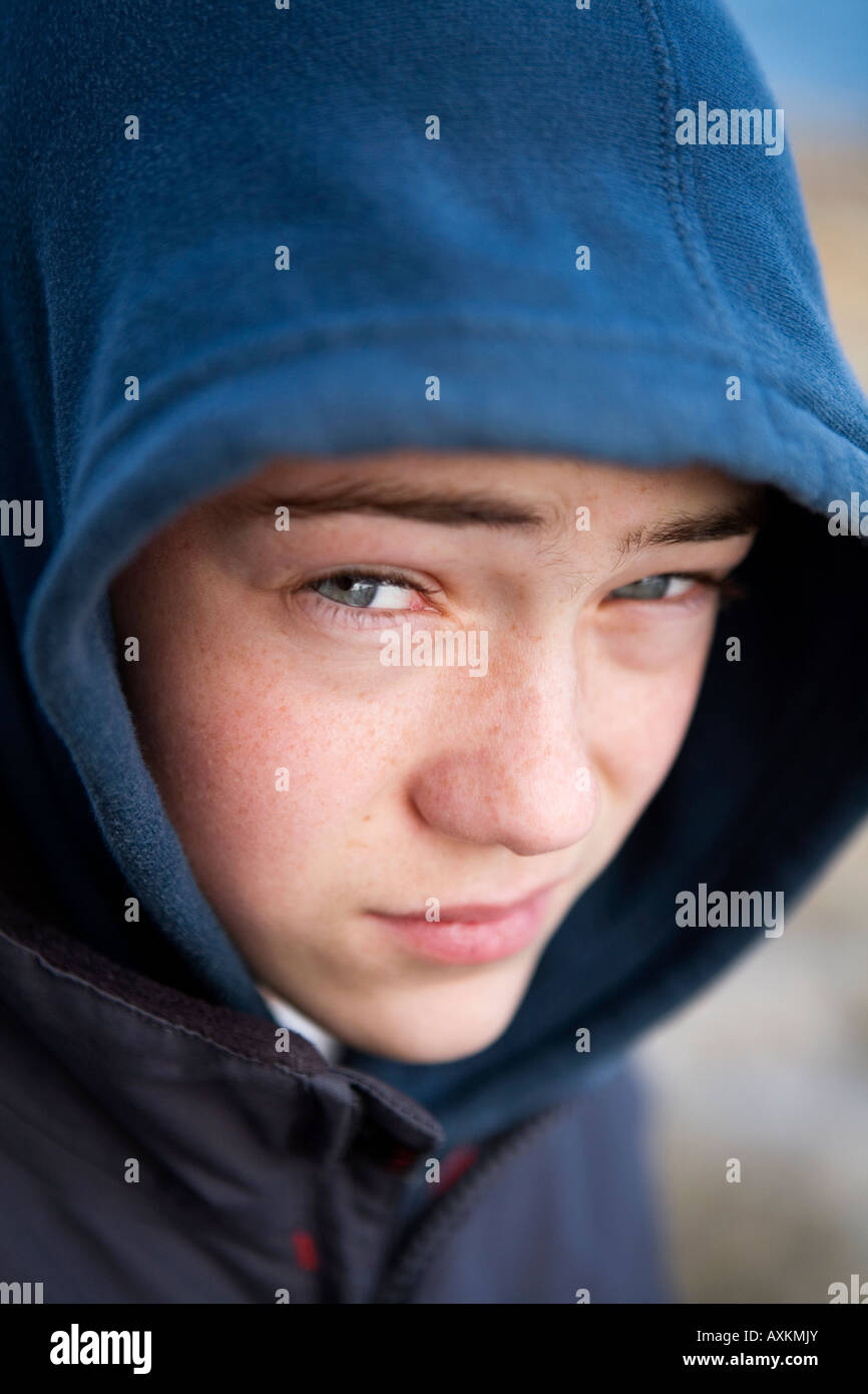 teenage boy looking moody Stock Photo - Alamy
