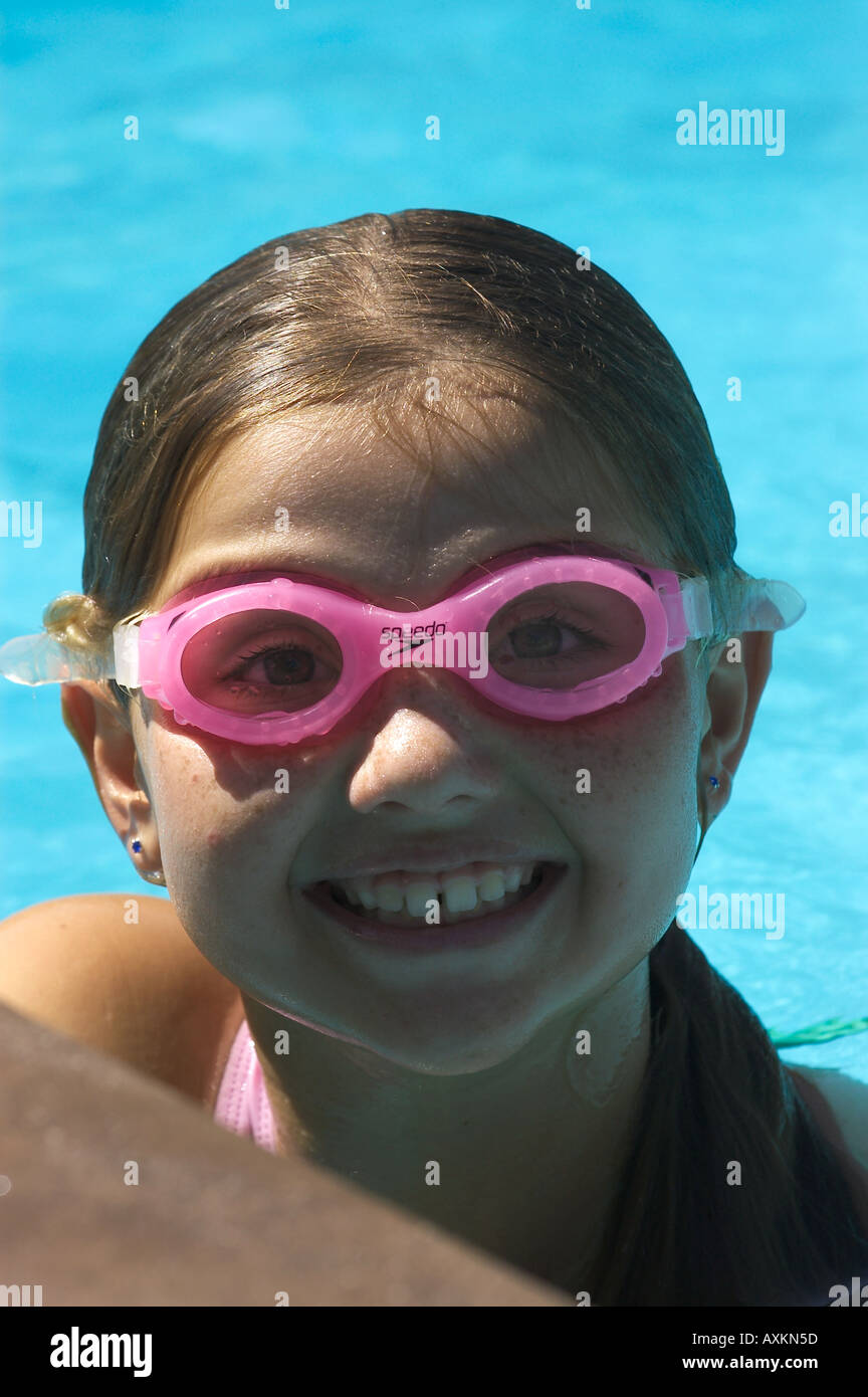 girl in pool with goggles Stock Photo