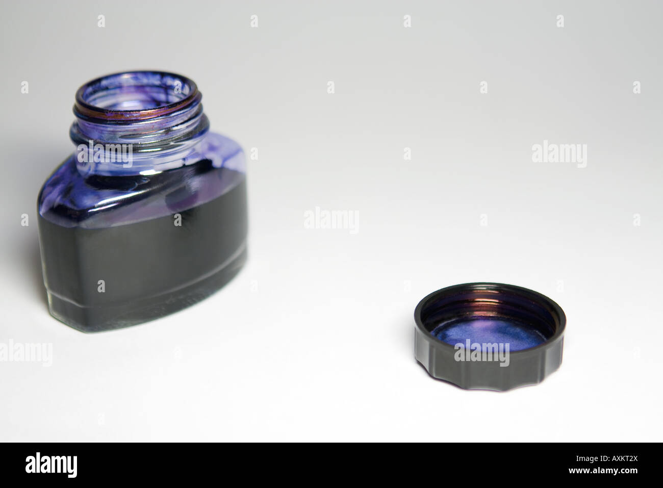 Opened ink bottle, closeup Stock Photo Alamy