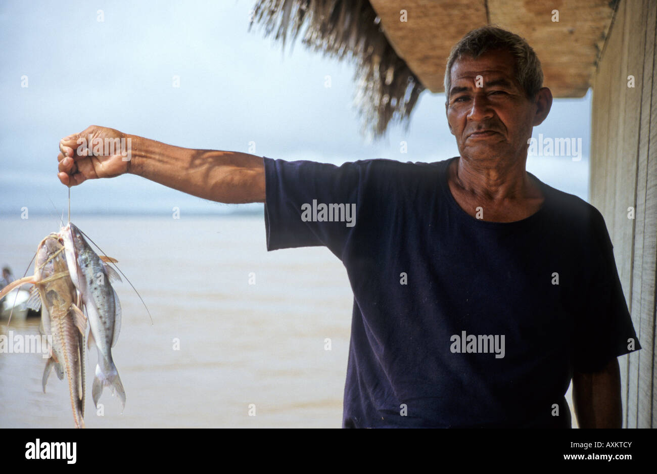 Fisherman, Amazon River, Peru, South America Stock Photo - Alamy