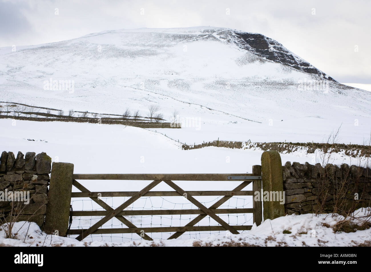 Looking towards a snow covered Mam Tor near Castleton in the Peak