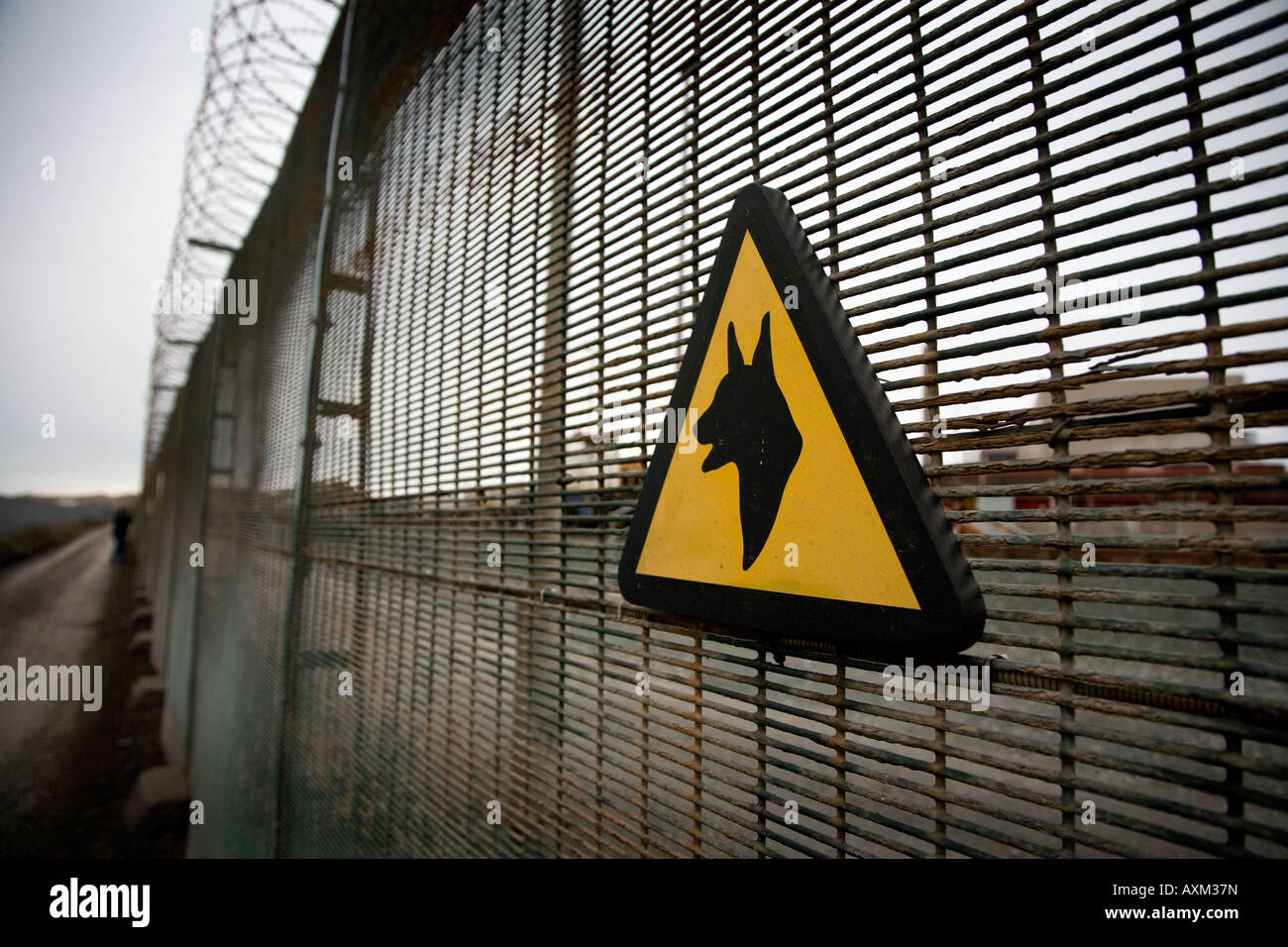 Warning guard dog sign on the perimeter fence of the Sellafield Nuclear