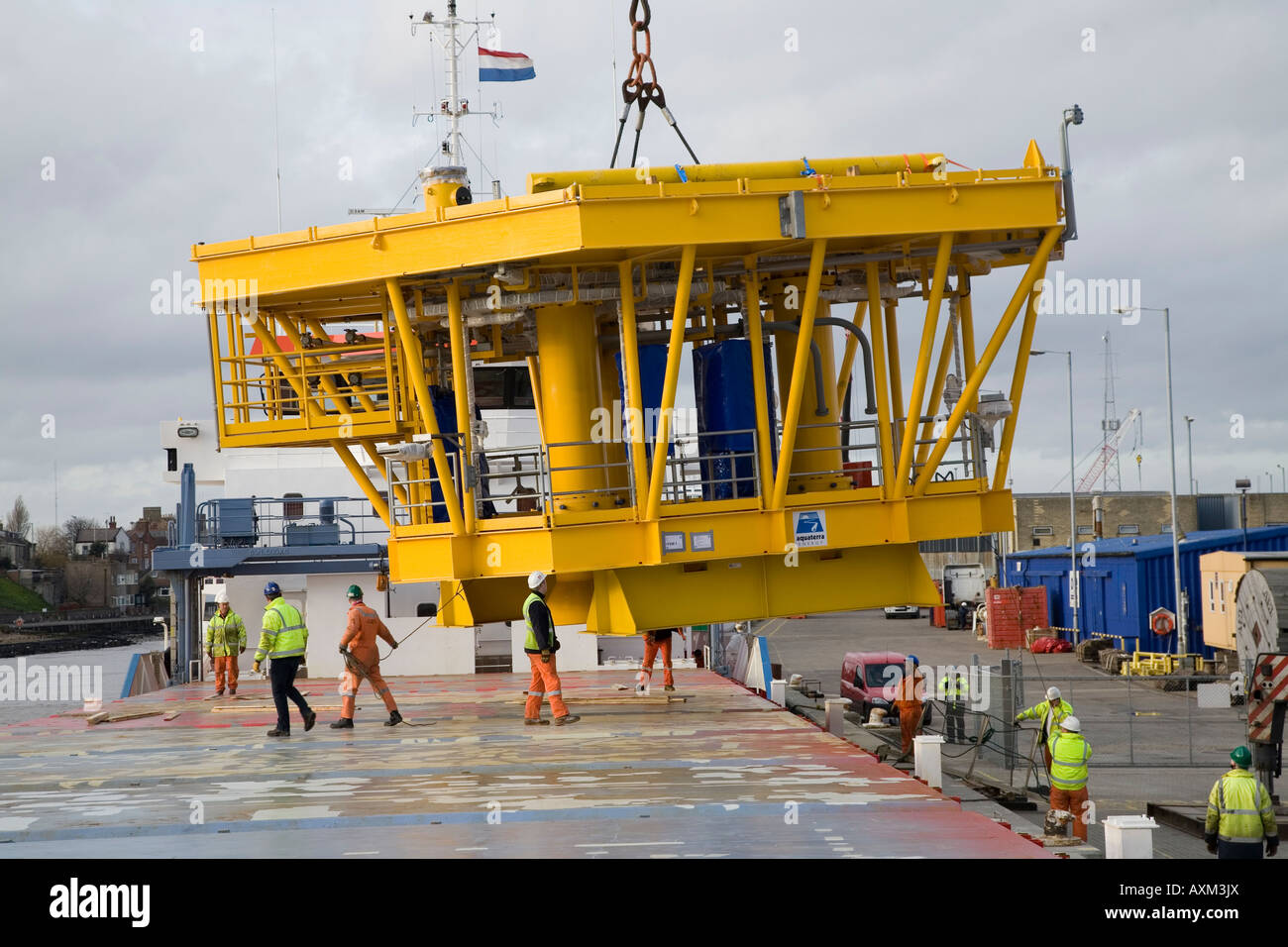 Rig platform being loaded onto container ship at Yarmouth Stock Photo ...
