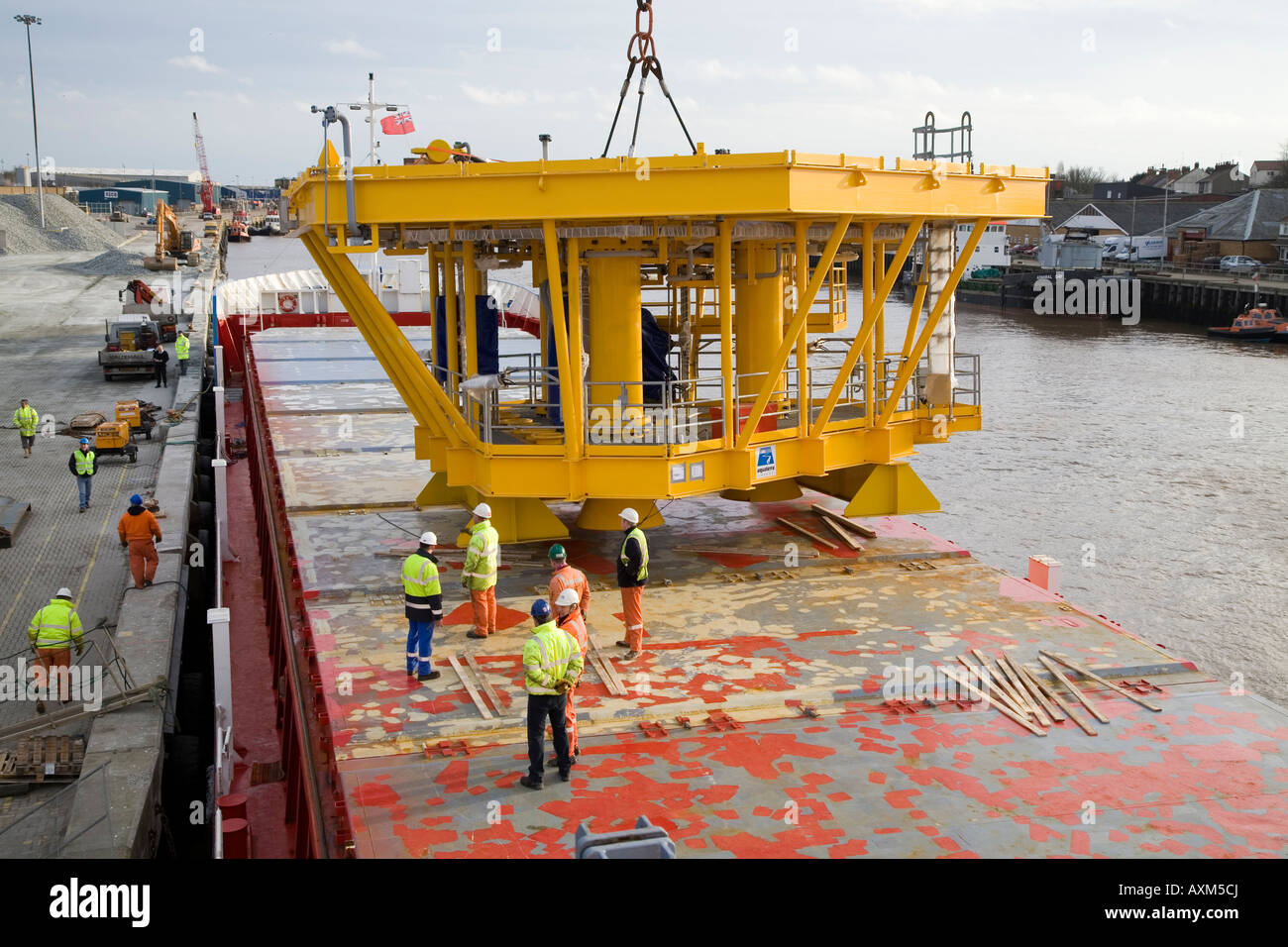 Rig platform being loaded onto container ship at Yarmouth Stock Photo ...