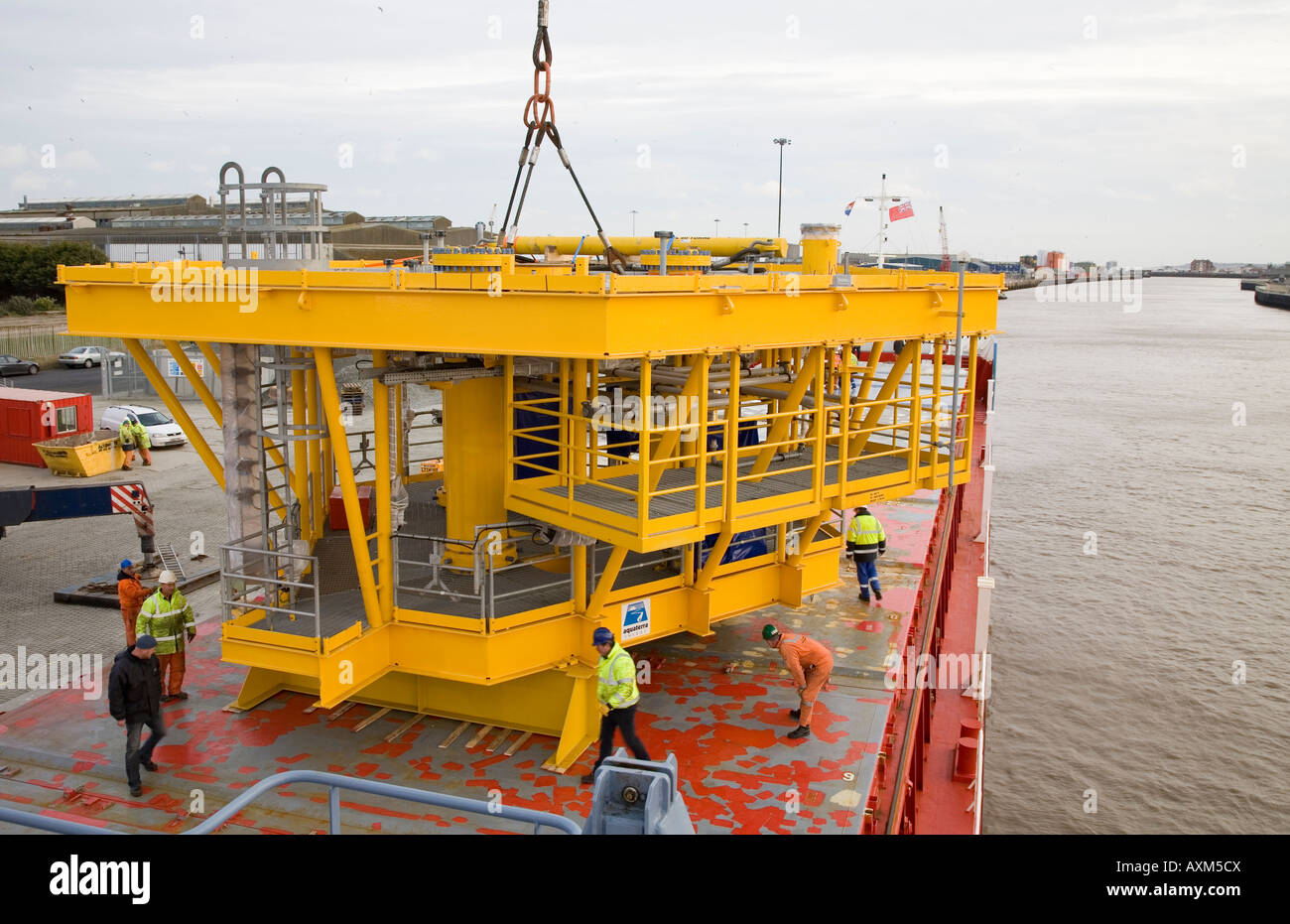 Rig structure being loaded onto cargo ship in Yarmouth bound for Africa ...