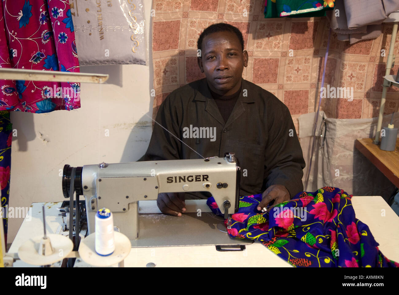 African man with sewing machine in Medina Tripoli Libya Stock Photo