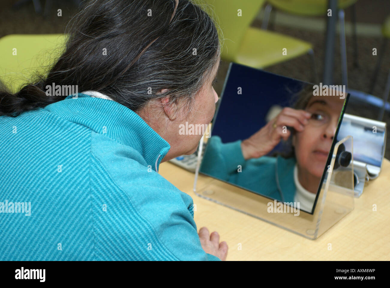 Checking Eye in Mirror Stock Photo Alamy
