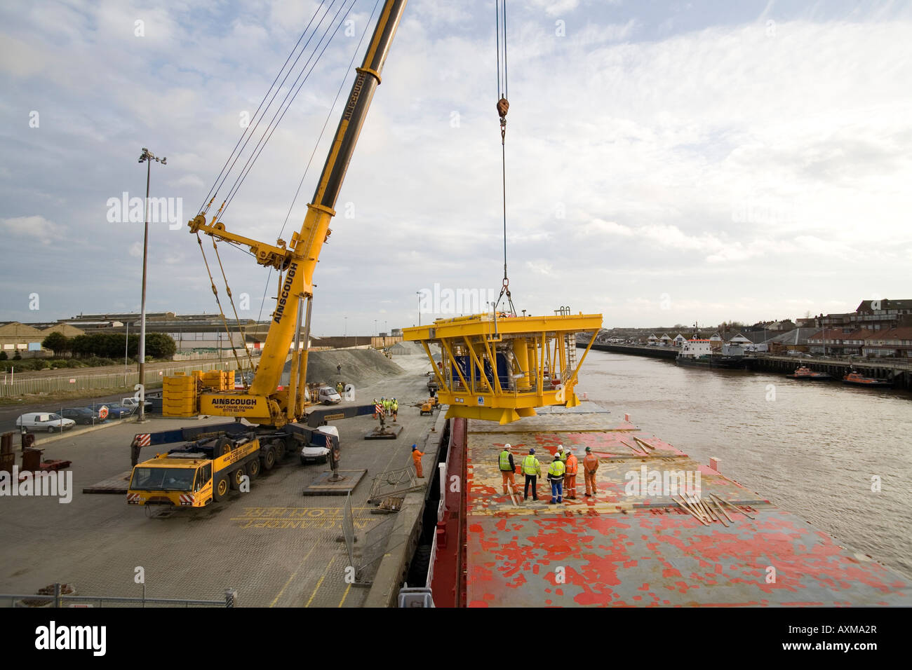 Rig platform being loaded onto container ship at Yarmouth Stock Photo ...