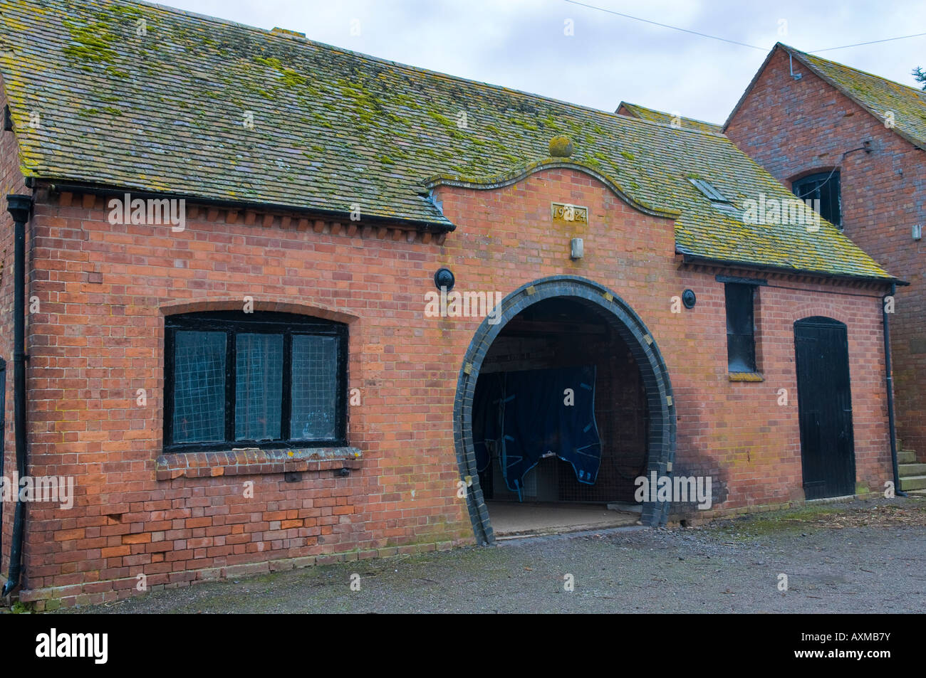Horseshoe shaped stable at Madresfield Court near Malvern in Worcestershire England Stock Photo
