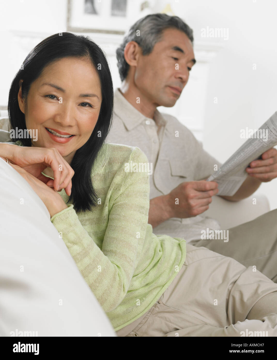 Middle age couple sitting asian hi-res stock photography and images - Alamy