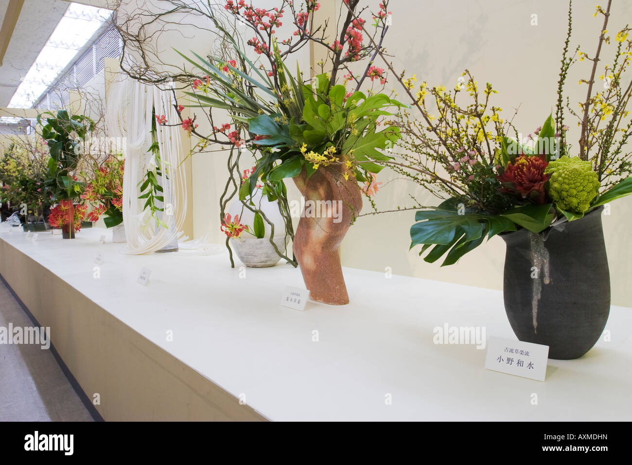 Display of flower arrangements at a Japanese ikebana exhibit Stock Photo
