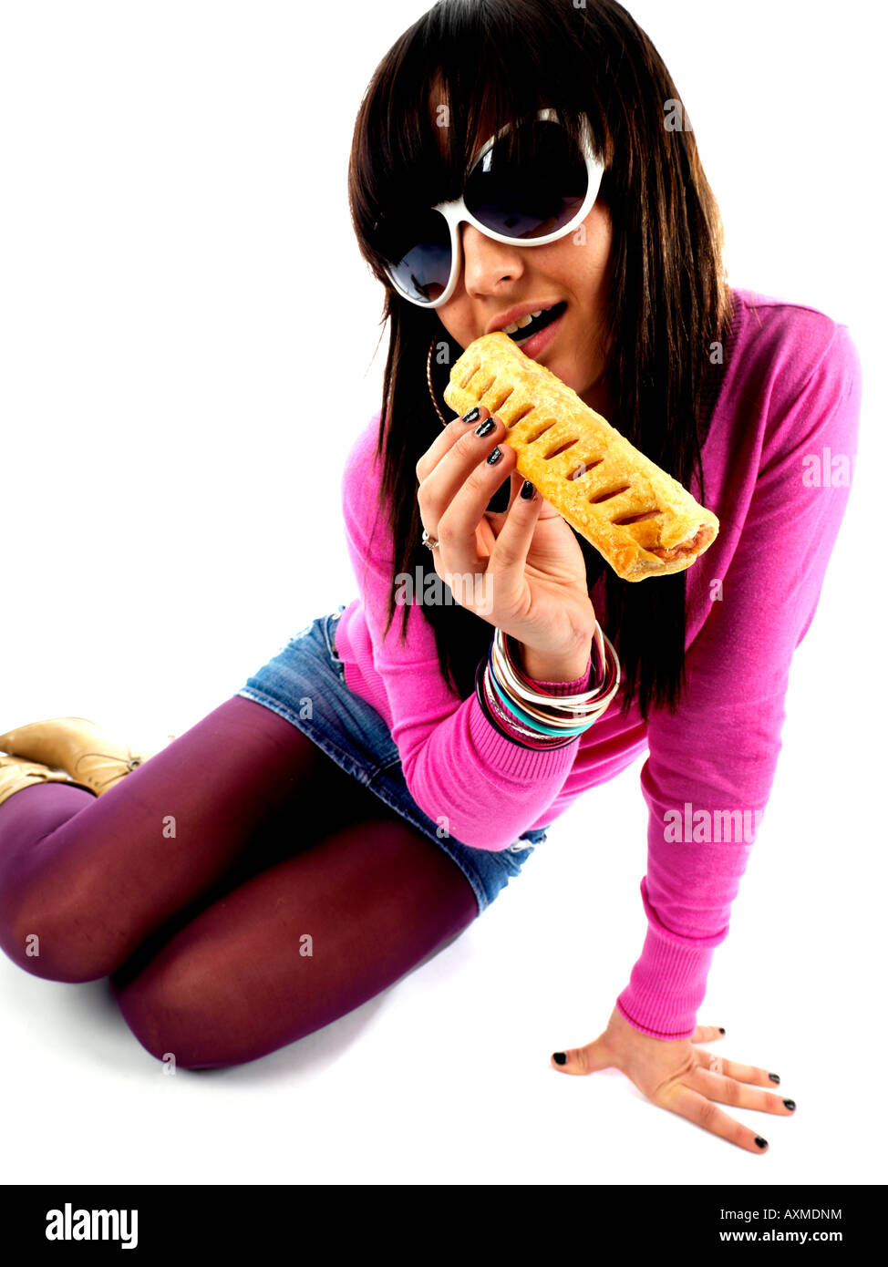 Young woman sausage roll hires stock photography and images Alamy